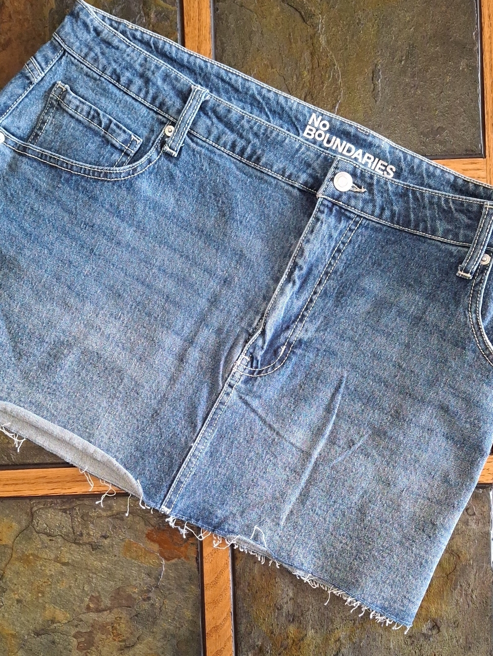 Faded Blue Denim Mini Skirt with Raw Hem
